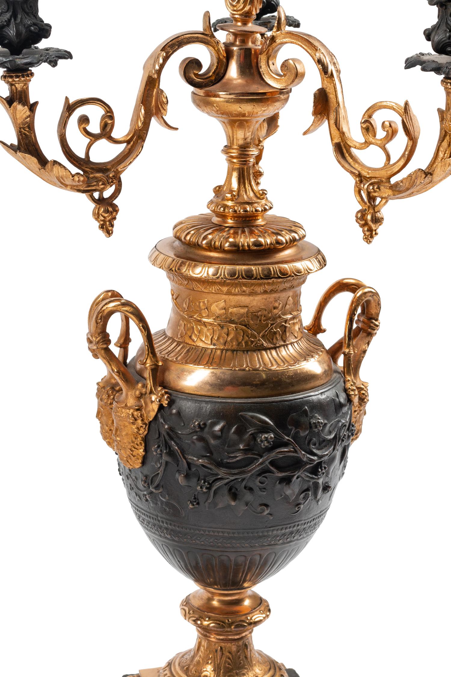 A Pair of Napoleon III Gilt and Patinated Bronze Four-Light Candelabra