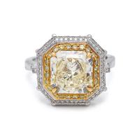 FANCY LIGHT YELLOW DIAMOND AND DIAMOND RING