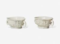 Two Similar Chinese Dehua Porcelain Twin Handled Cups