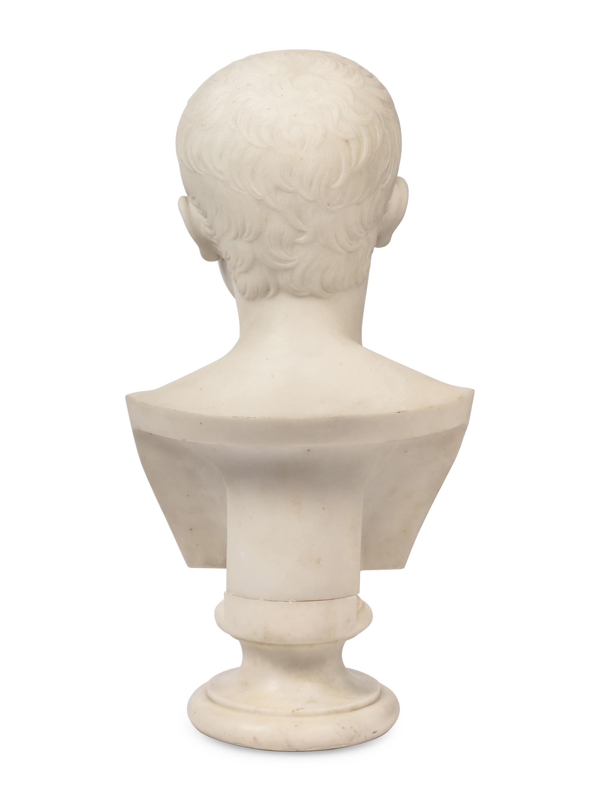 A Continental Carved Marble Bust of the Young Augustus