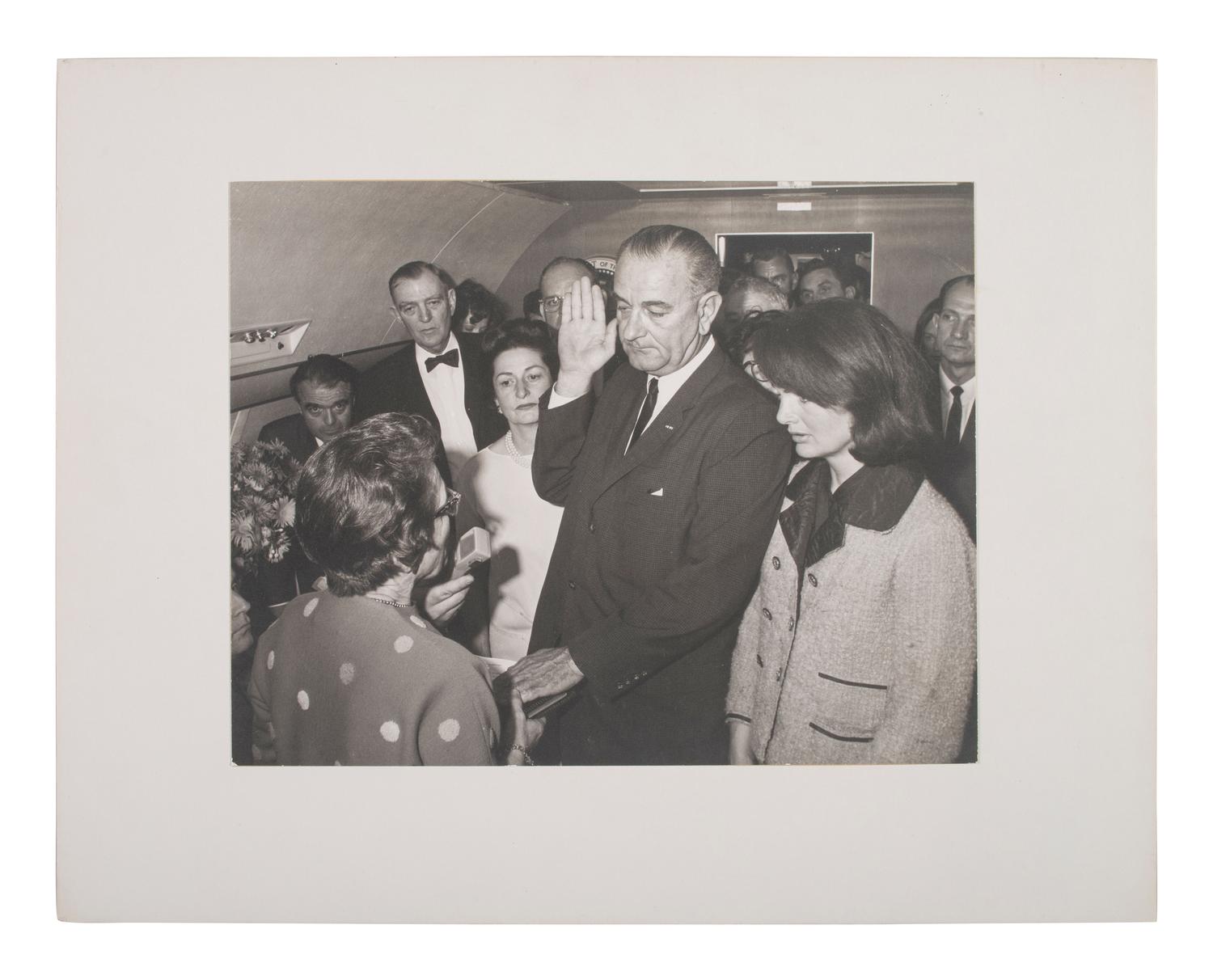 [POLITICS]. STOUGHTON, Cecil (1920-2008), photographer. Photograph of Lyndon B. Johnson's swearing-in aboard Air Force One.