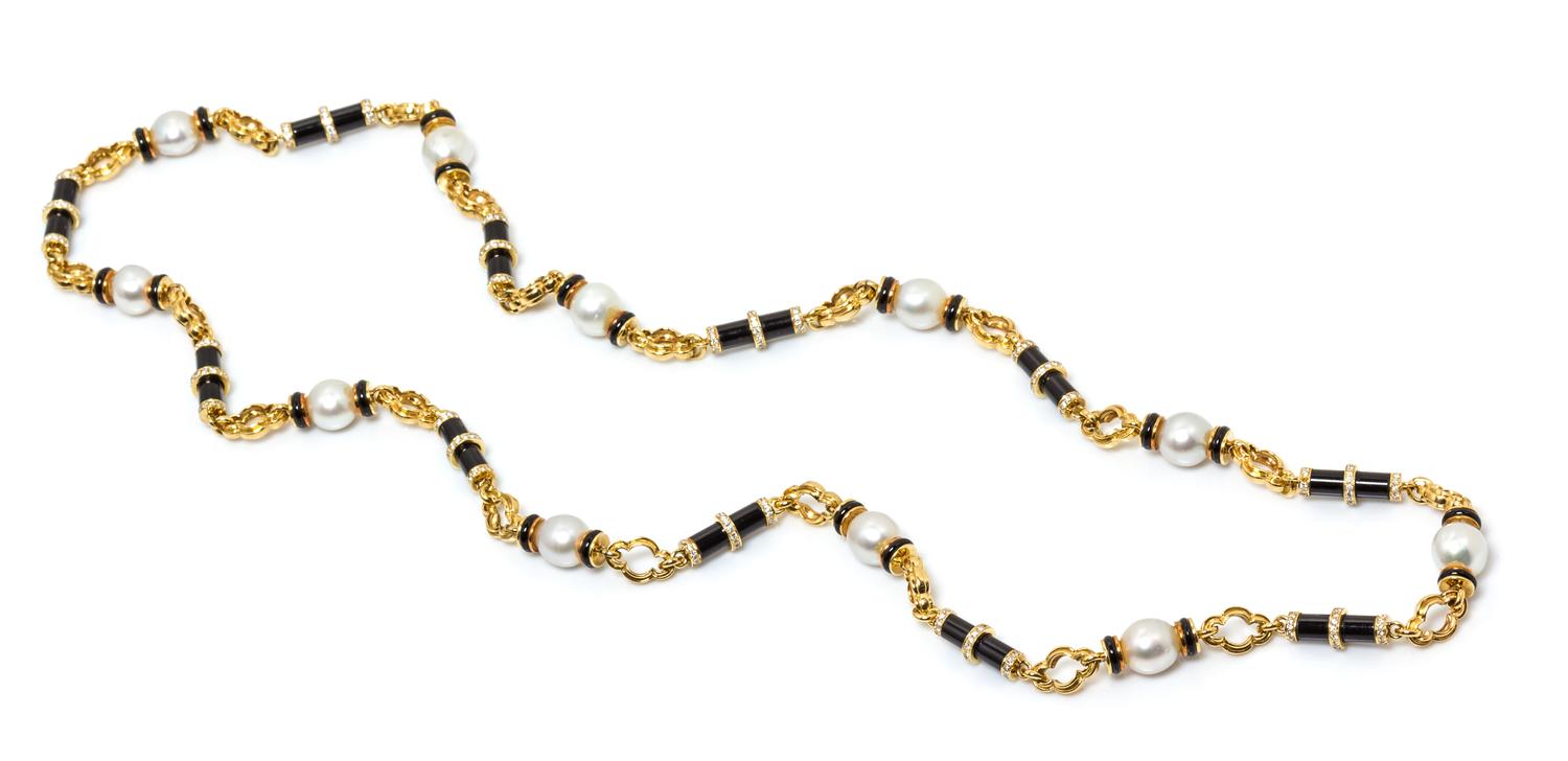 A Yellow Gold, Cultured South Sea Pearl, Diamond and Onyx Longchain Necklace, 131.00 dwts.