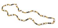 A Yellow Gold, Cultured South Sea Pearl, Diamond and Onyx Longchain Necklace, 131.00 dwts.