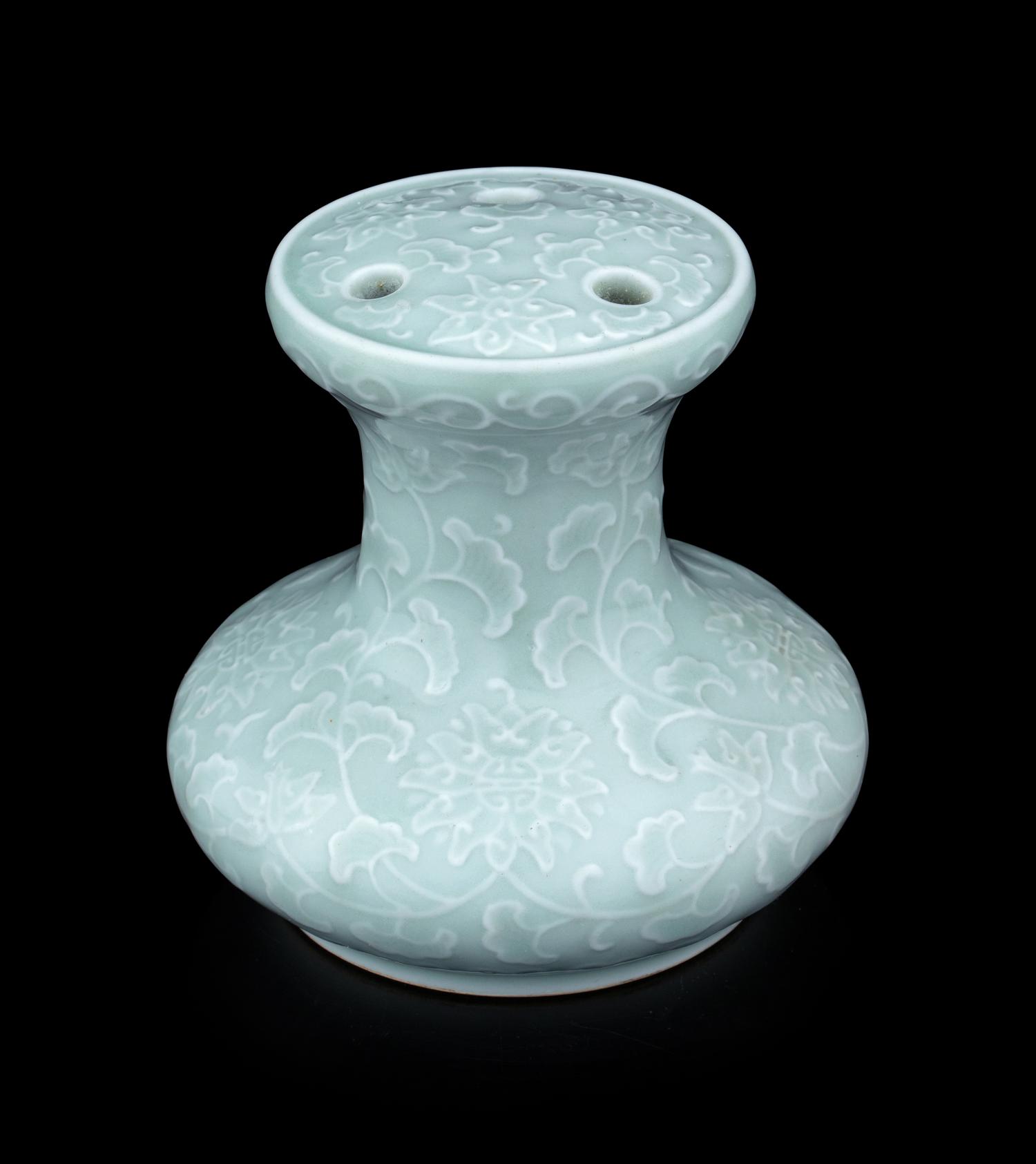 A Pale Celadon Glazed Molded Flower Pot