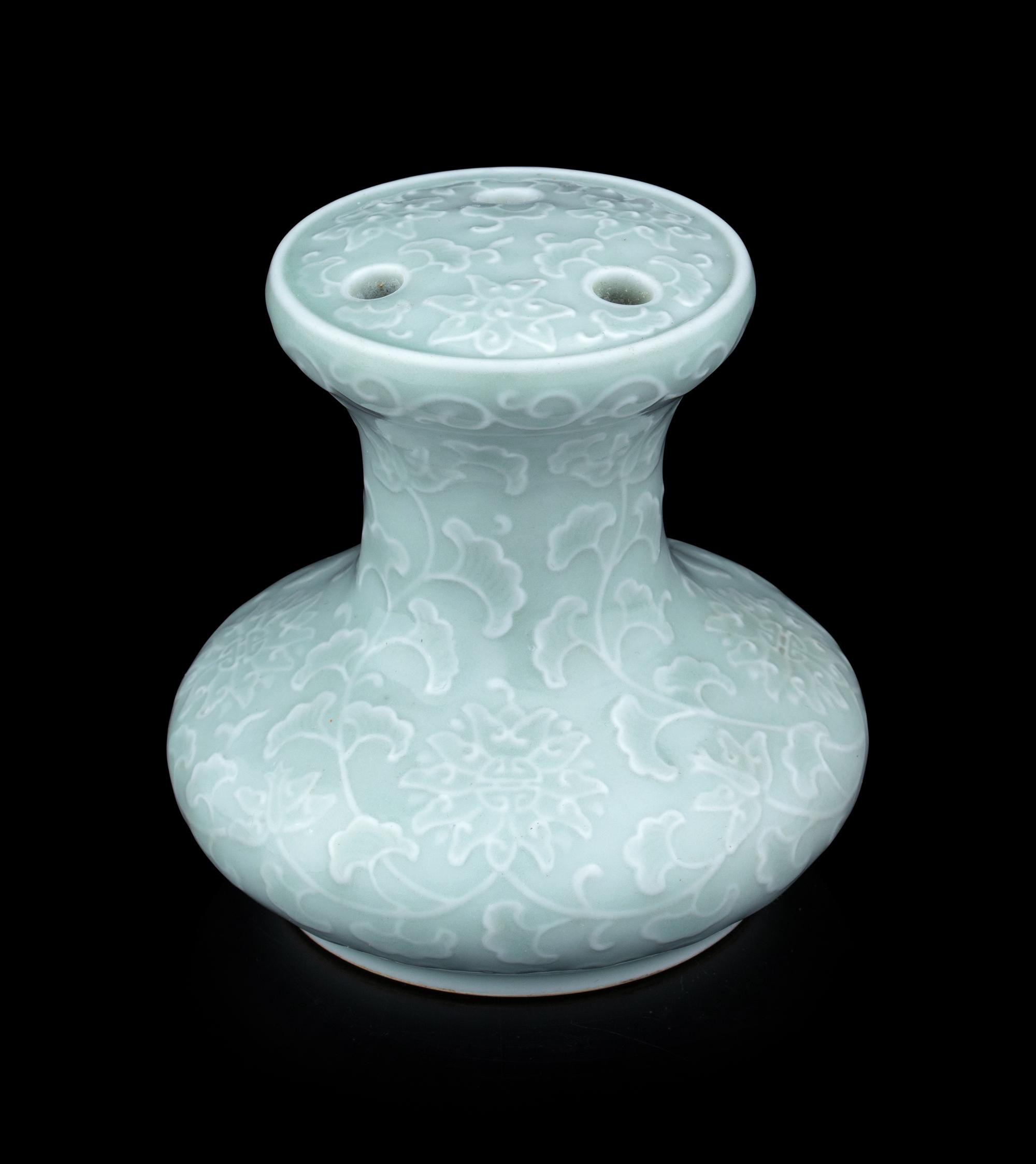 A Pale Celadon Glazed Molded Flower Pot