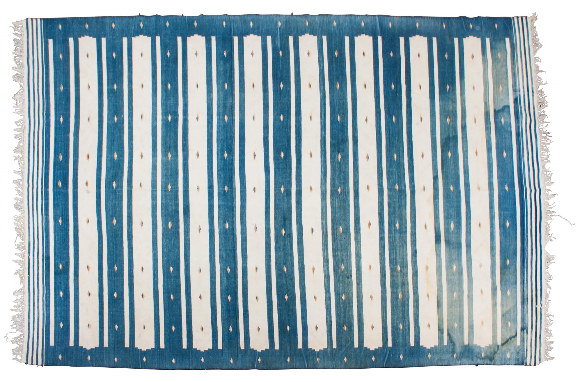 A Dhurrie Rug 11 feet 7 inches x 8 feet 2 inches. — 20TH CENTURY