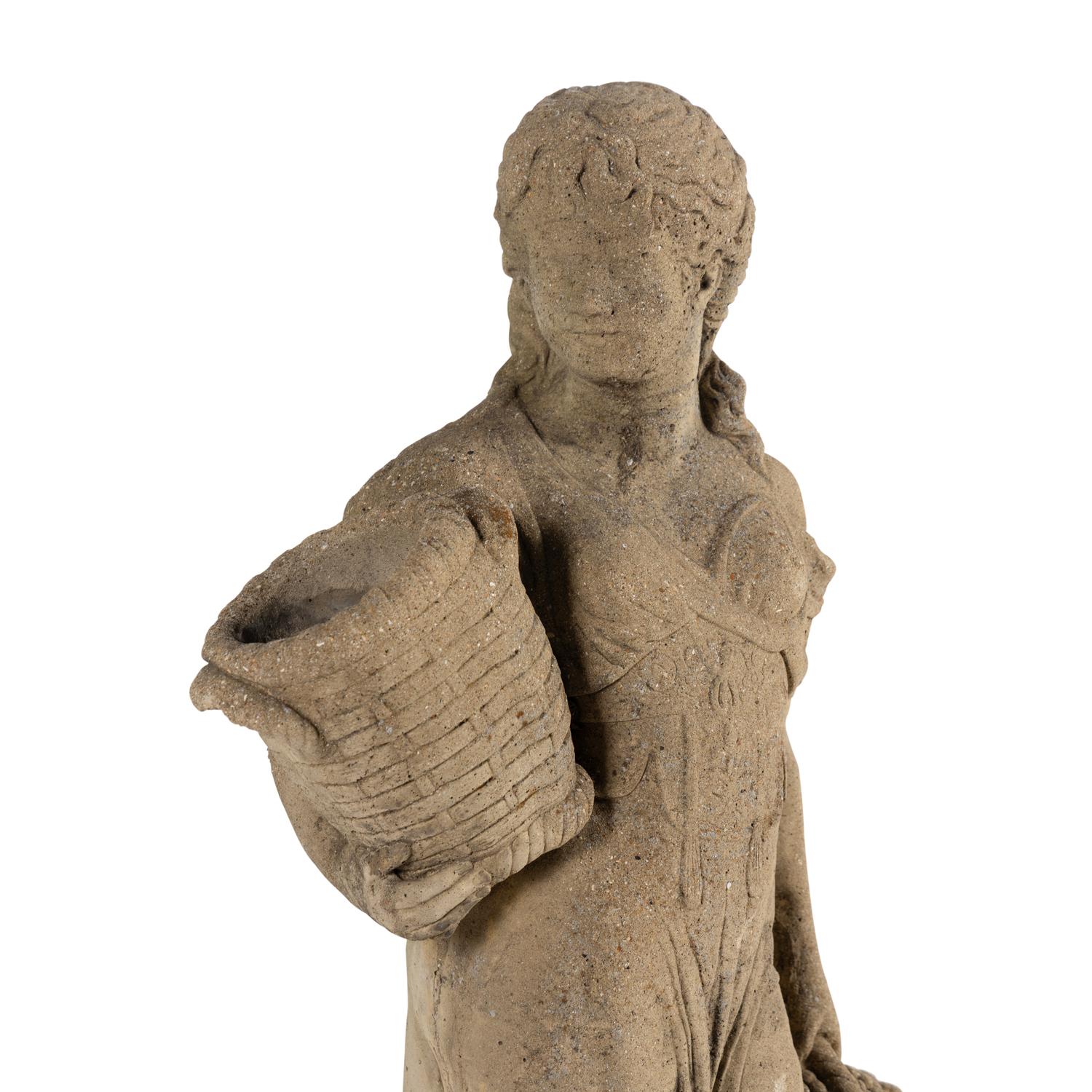 A Cast Stone Garden Figure