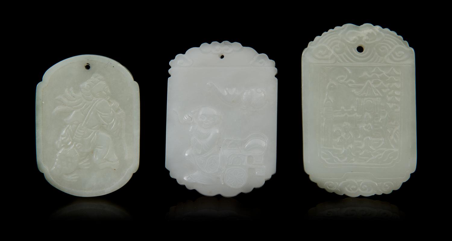 Three Carved Jade Pendants Length of first 2 1/8 inches.