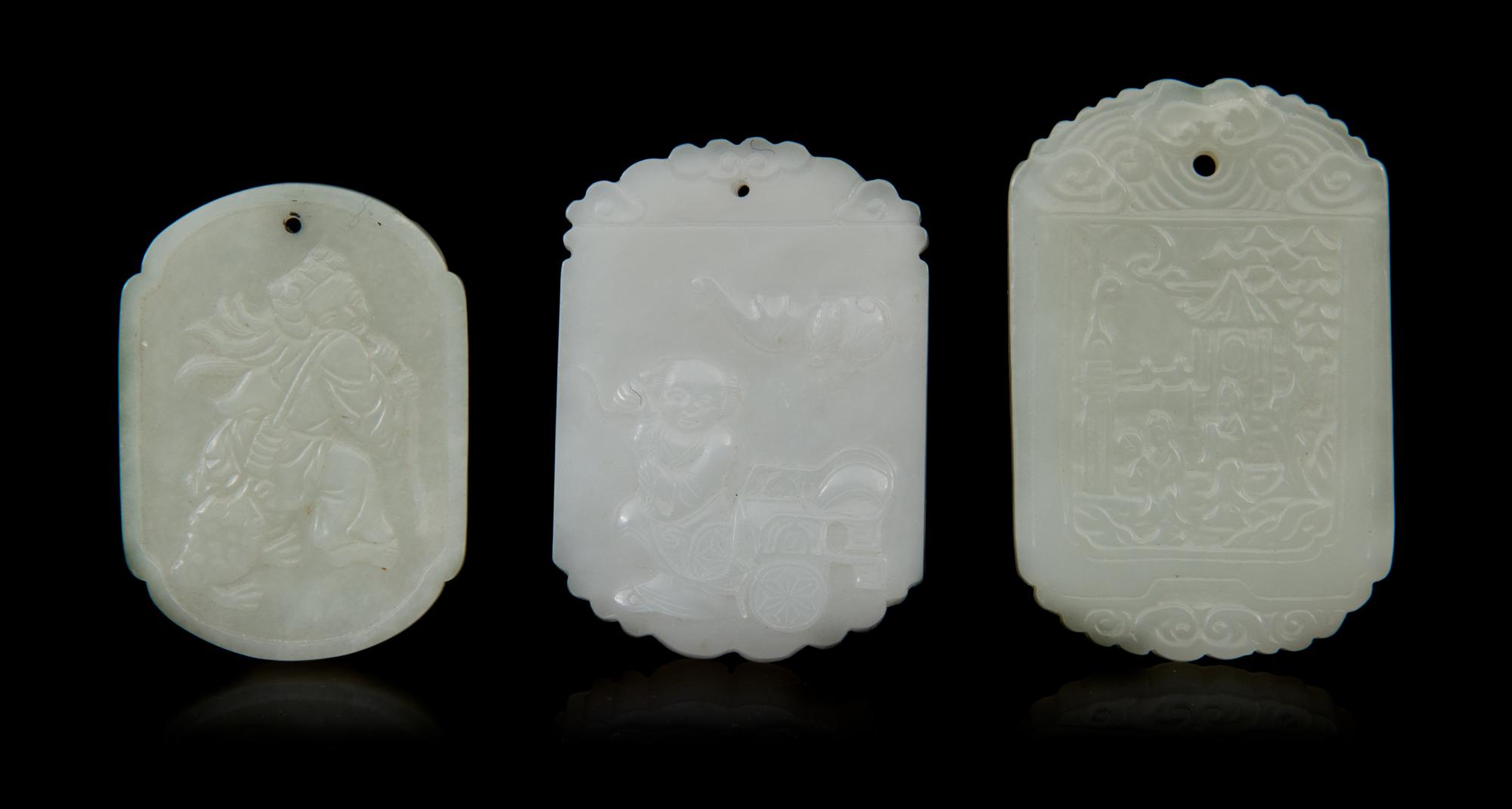 Three Carved Jade Pendants Length of first 2 1/8 inches.