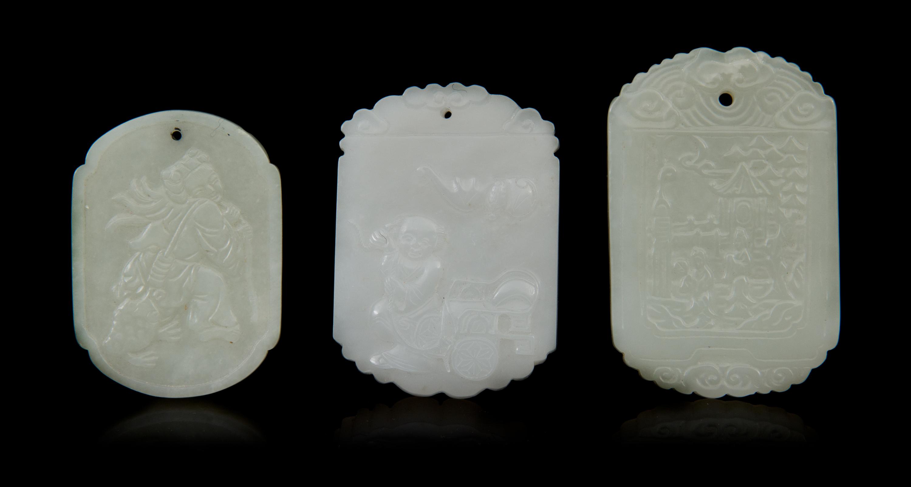 Three Carved Jade Pendants Length of first 2 1/8 inches.