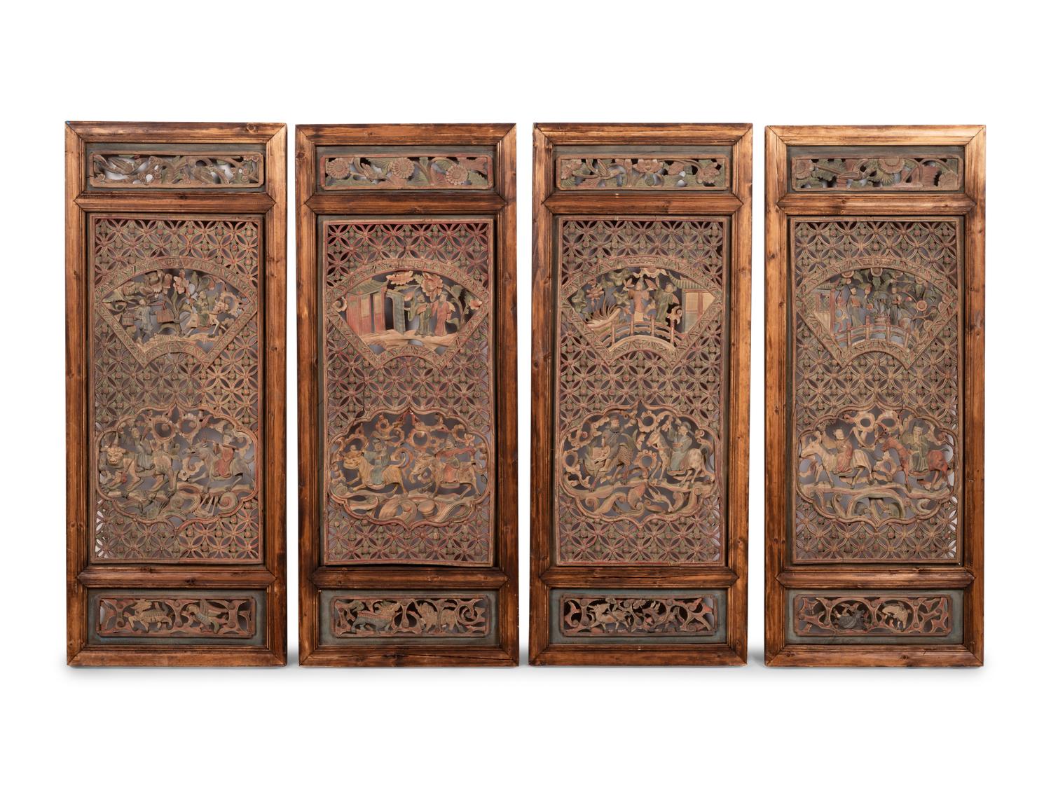 A Group of Four Chinese Pierce-Carved and Polychrome Decorated Window Panels