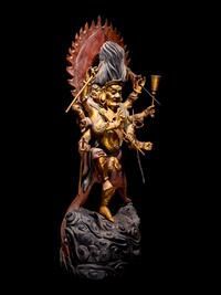 A Large Gilt and Red Lacquered Wood Figure of Mahakala