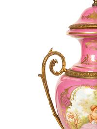 A Pair of French Porcelain Lidded Urns