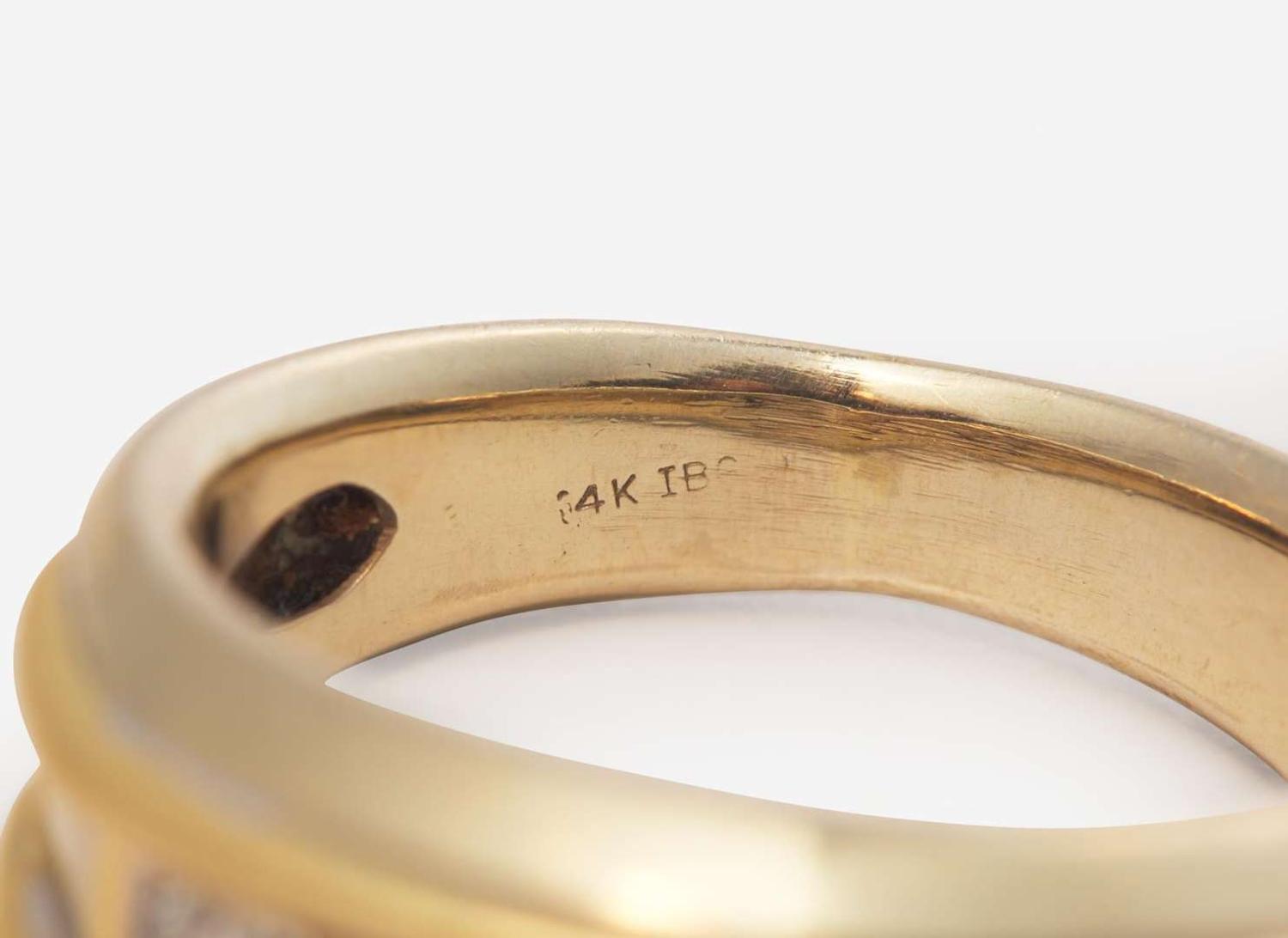 A Group of Men's Diamond Rings