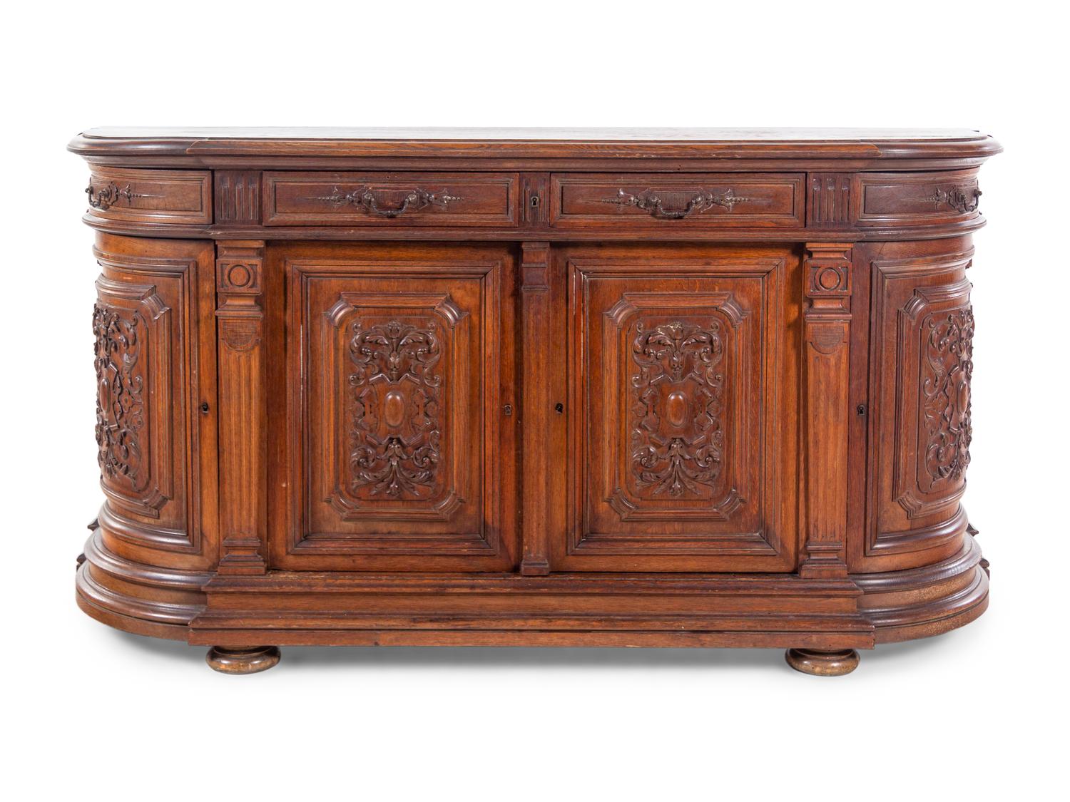 A Renaissance Revival Carved Oak Buffet