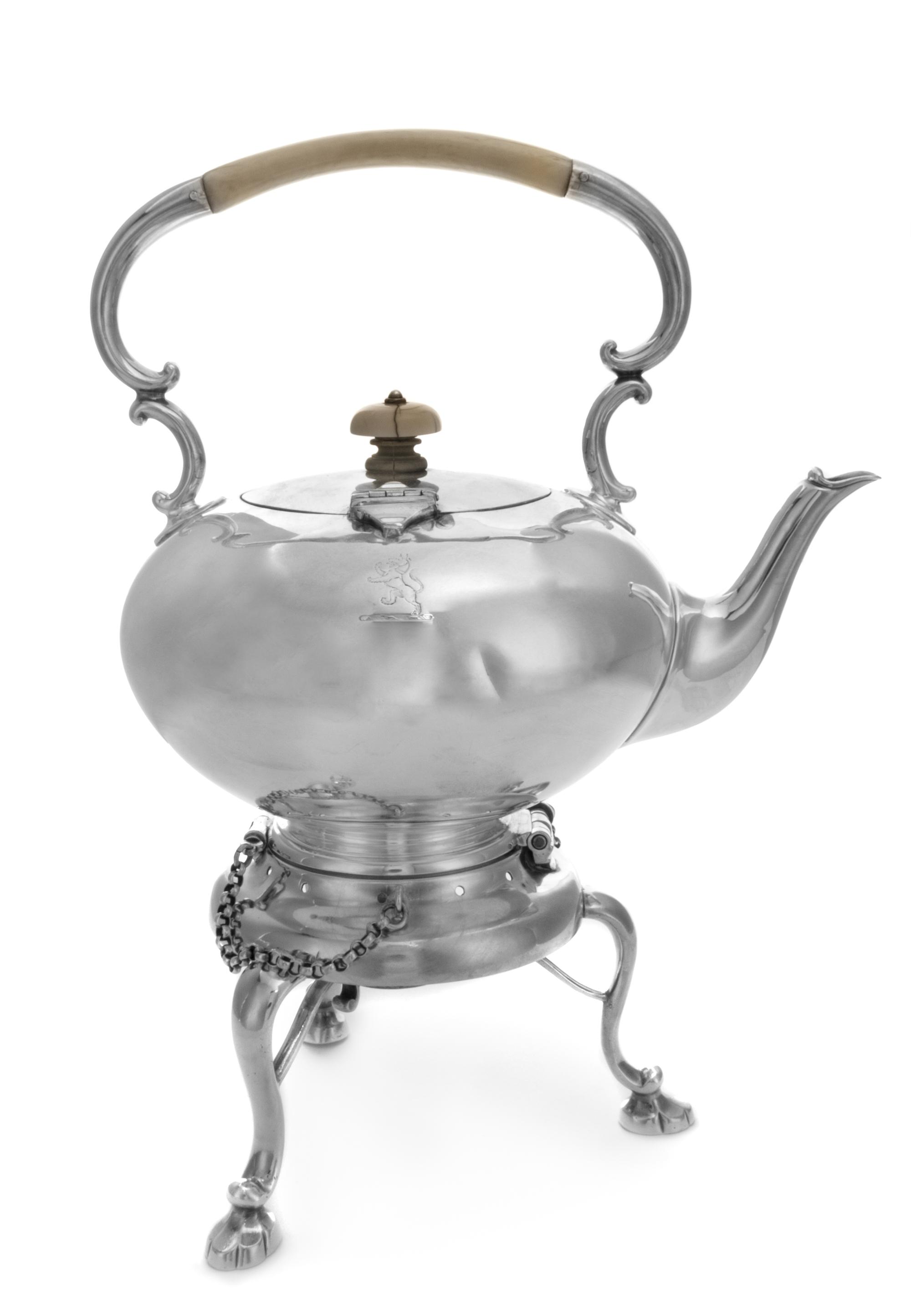 An English Silver-Plate Kettle on Stand, Atkin Bros, London, having a C-scroll handle, the body of the kettle engraved with a wolf ramp