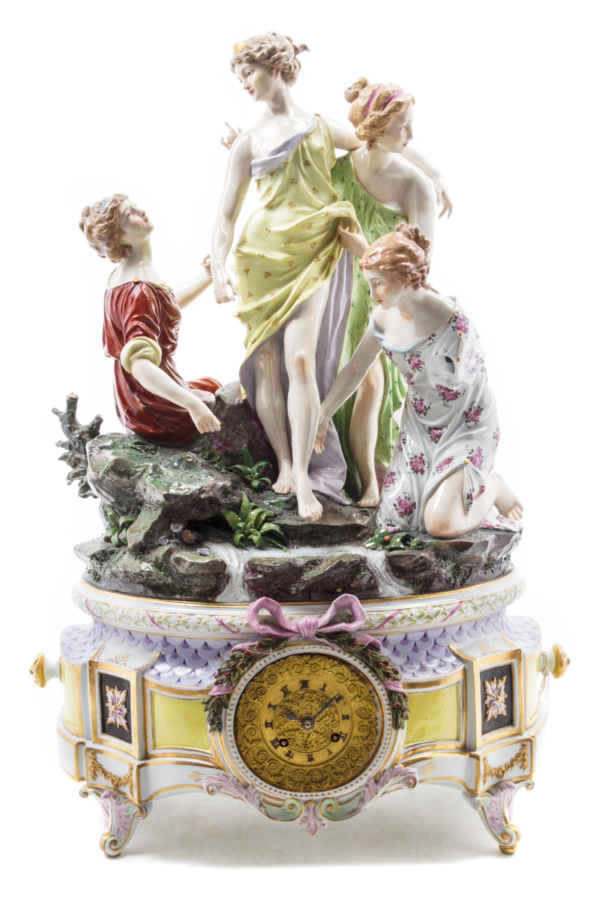 A Continental Porcelain Mantel Clock Height 25 inches x width 19 1/2 inches x depth 12 inches. — 19TH CENTURY