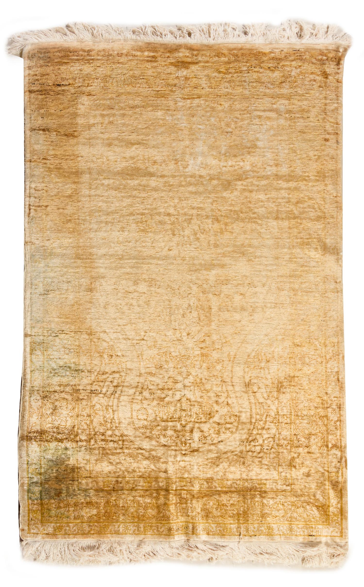A Silk Rug 5 feet 2 1/2 inches x 3 feet 3 1/2 inches.