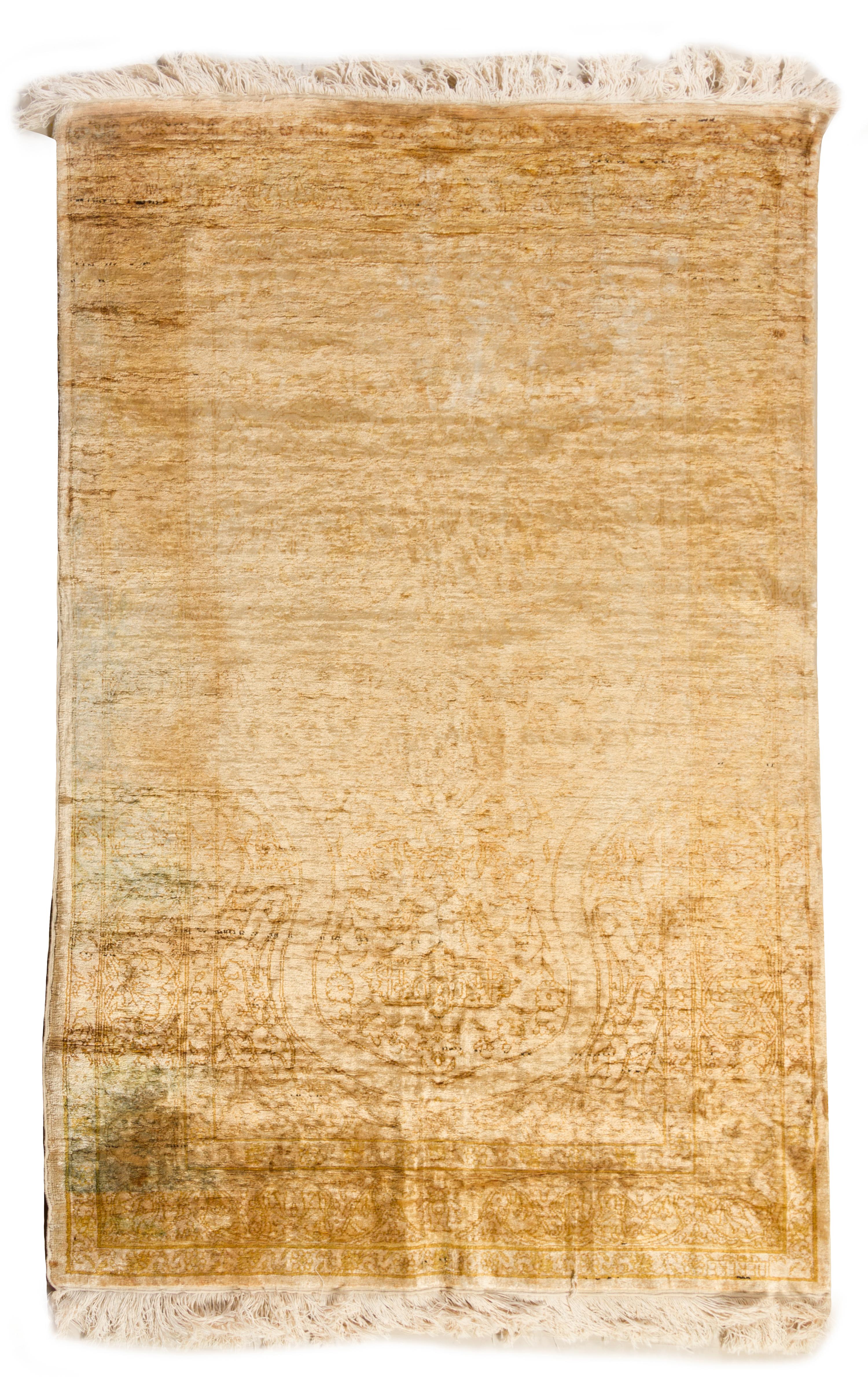 A Silk Rug 5 feet 2 1/2 inches x 3 feet 3 1/2 inches.