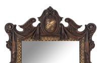 A Continental Parcel Gilt Oak Mirror