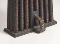 A group of five tole or painted and decorated tinware table items, probably Pennsylvania, 19th / 20th century