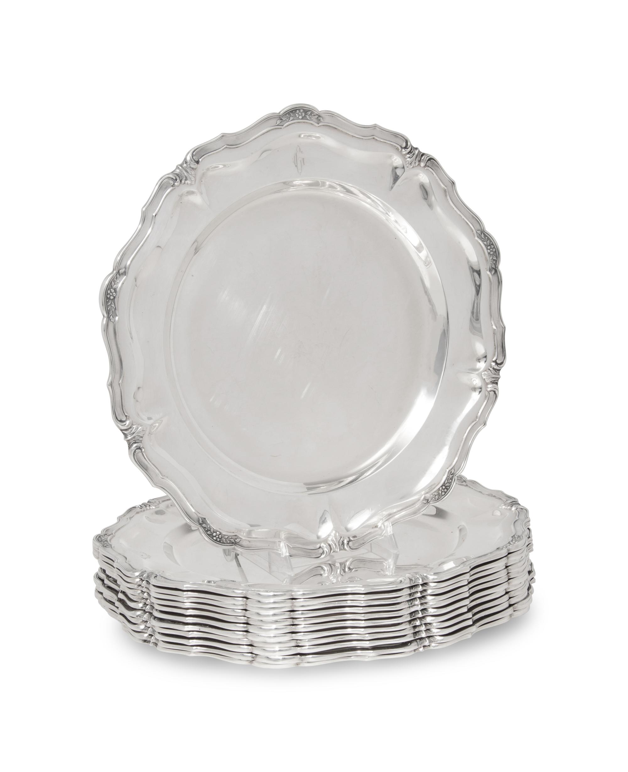 A Set of Twelve Peruvian Silver Dinner Plates