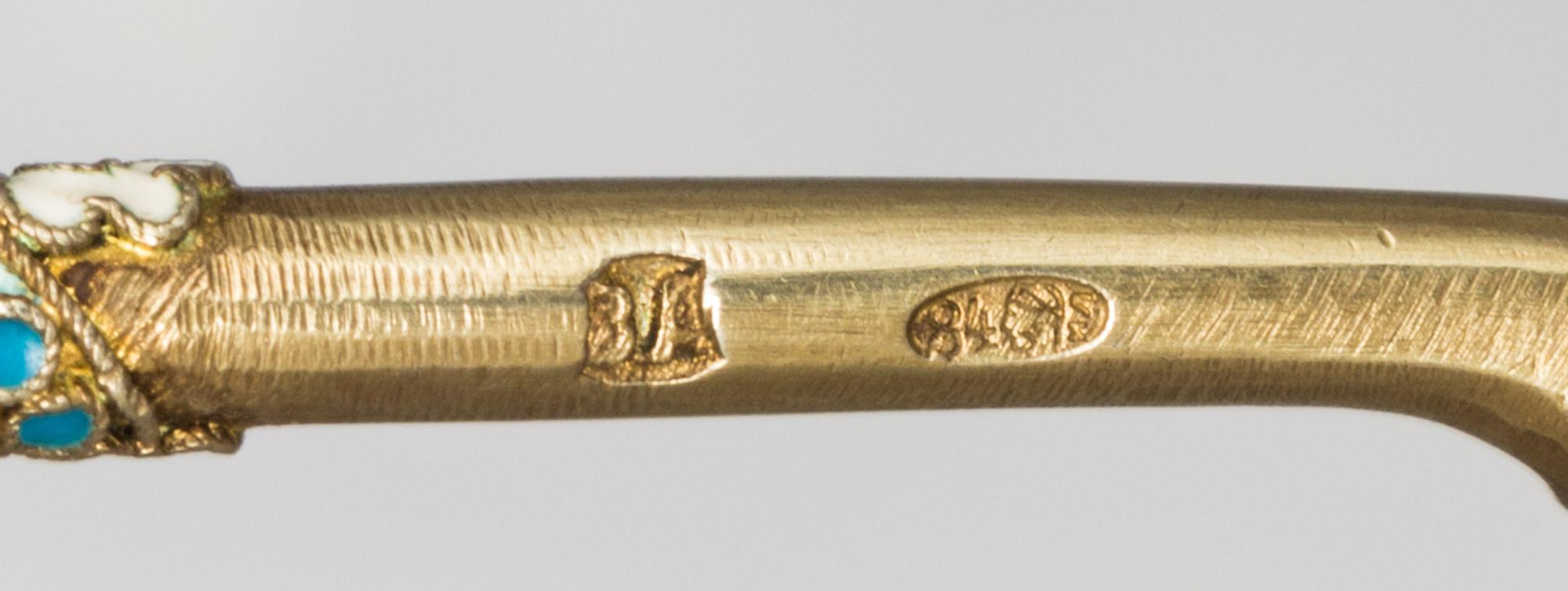 A Russian Silver-Gilt and Enamel Spoon, Mark of Third Artel, Moscow, early 20th century, the underside of the bowl with a polychrome bi
