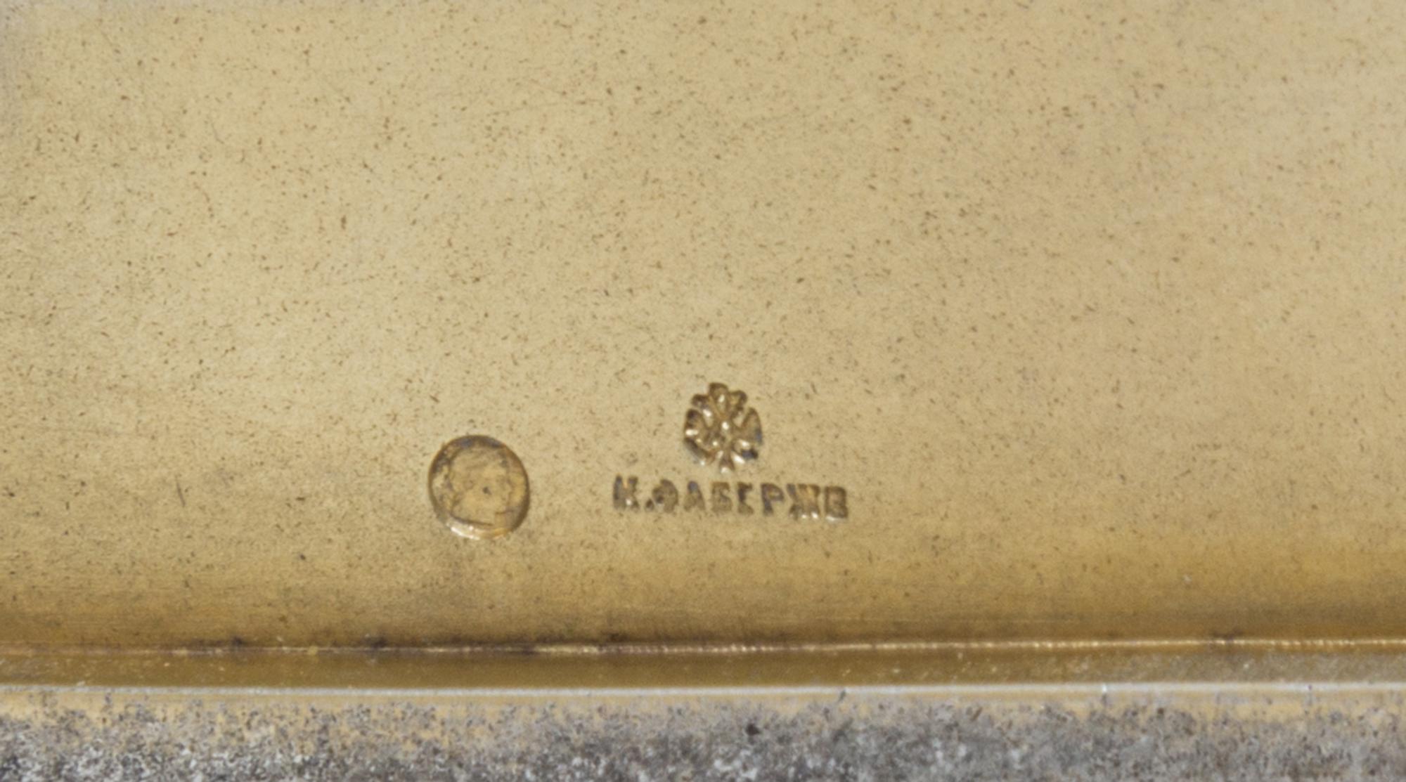 A Russian Ruby and Sapphire Inset Silver Cigarette Case, Mark of Faberge with Imperial warrant, Moscow, 20th century, the lid worked to