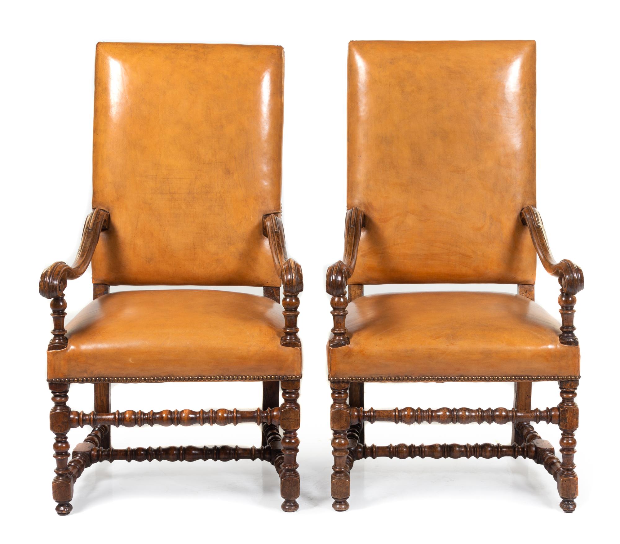 A Pair of Louis XIV Walnut Armchairs Height 48 inches. — 18TH CENTURY