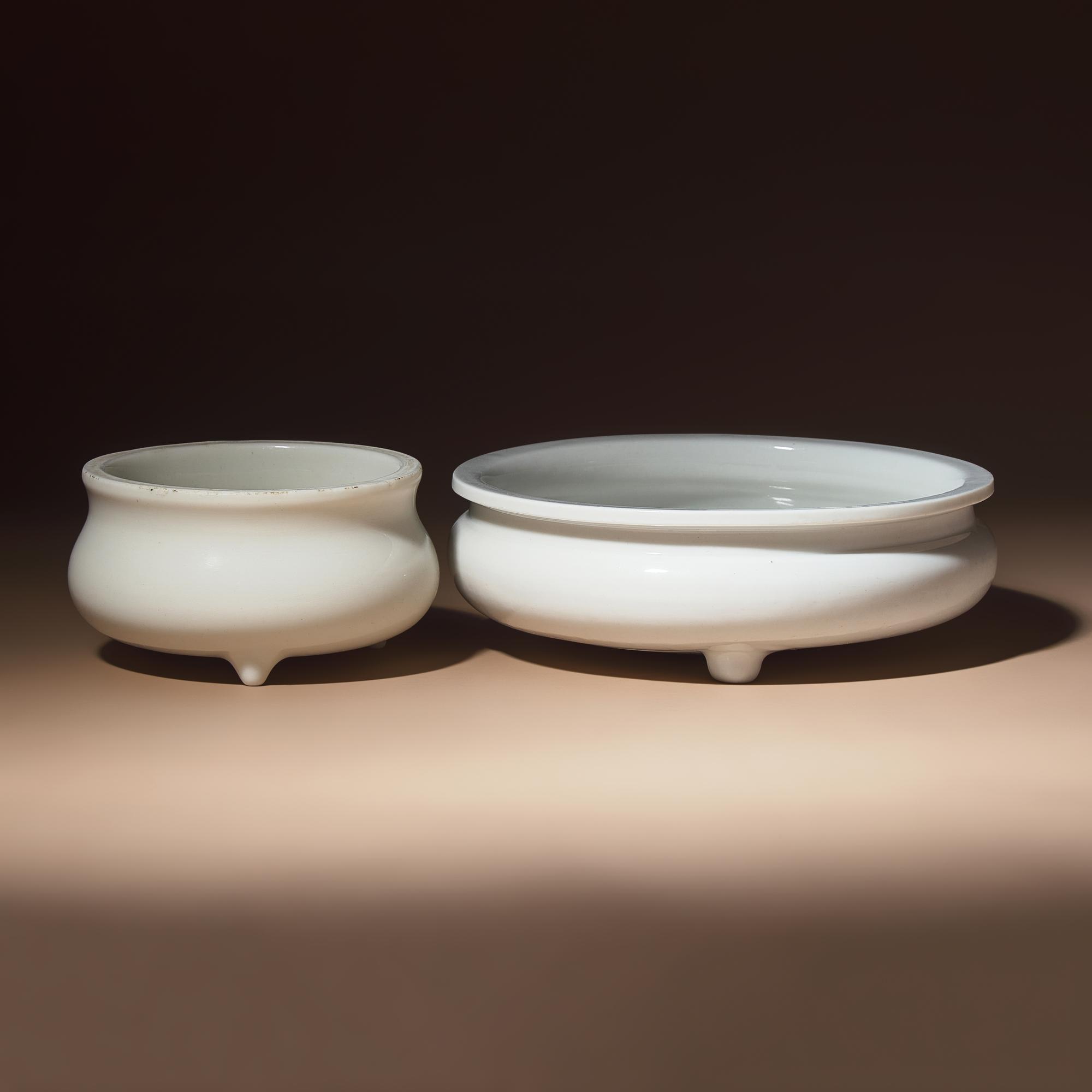Two Chinese Blanc-de-Chine Porcelain Tripod Censers, Early Qing Dynasty — 清早期 德化白瓷三足爐兩具
