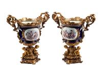 A Pair of Gilt Bronze Mounted Sèvres Style Porcelain Cache Pots