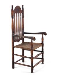A William and Mary Style Parcel Gilt and Red Painted, Fan-Carved Bannister Back Woven Splint Seat Armchair