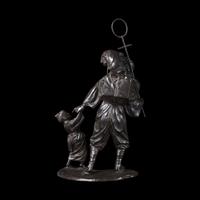 A Japanese Tokyo School Patinated Bronze Monkey Trainer Figural Group, Meiji/Taisho Period
