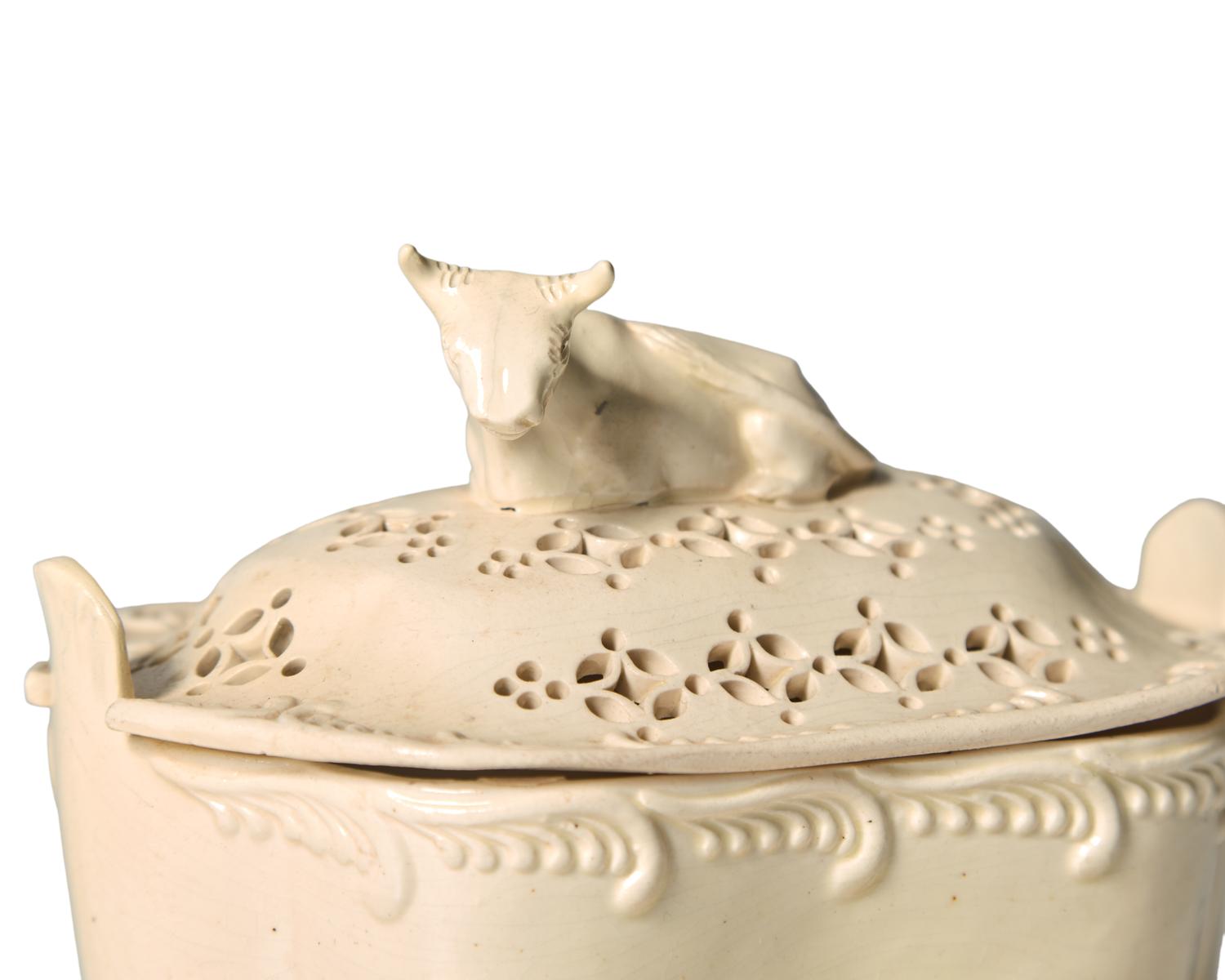 A Staffordshire Reticulated Creamware Covered Butter Dish and Stand