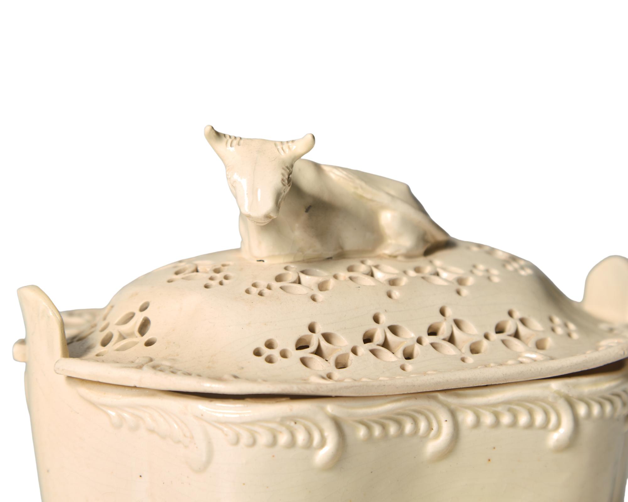 A Staffordshire Reticulated Creamware Covered Butter Dish and Stand