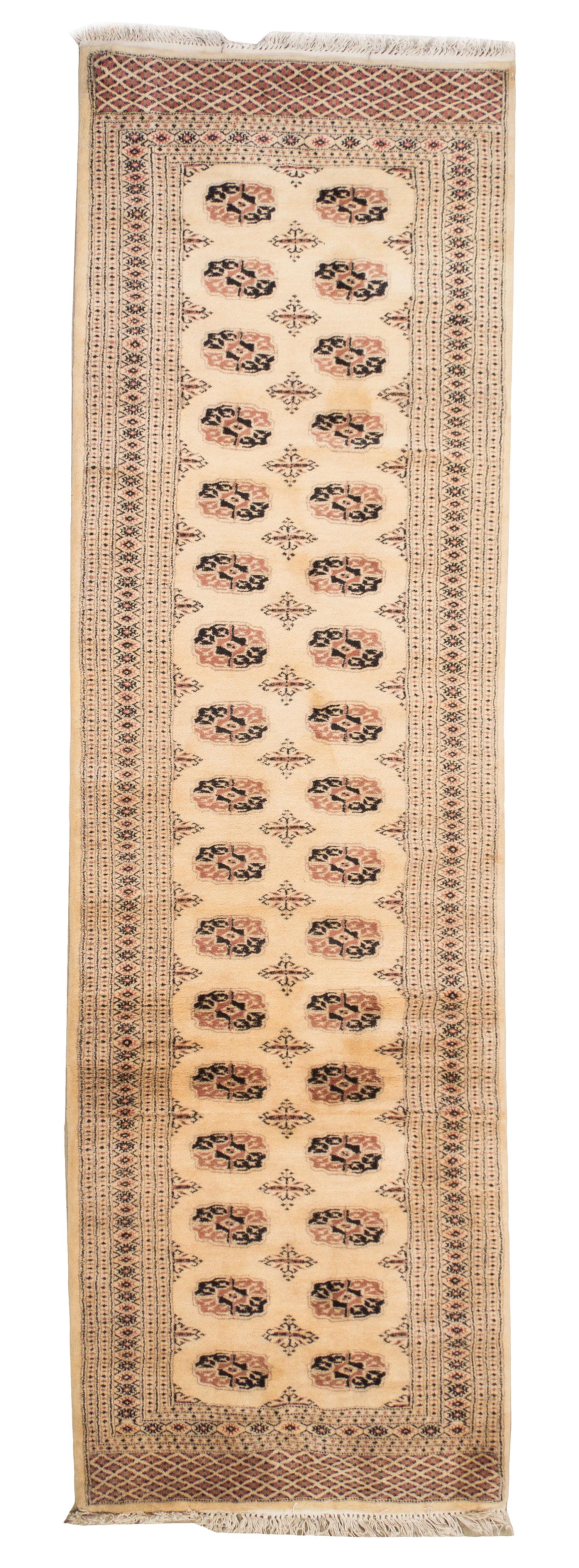 A Bokhara Wool Runner, 9 feet 10 inches x 3 feet 2 inches