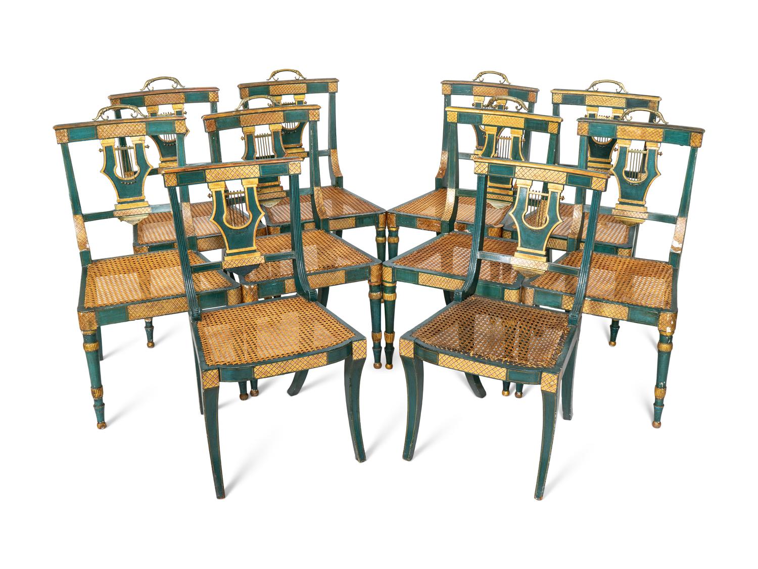A Set of Eight Continental Green Painted and Parcel Gilt Lyre-Back Dining Chairs
