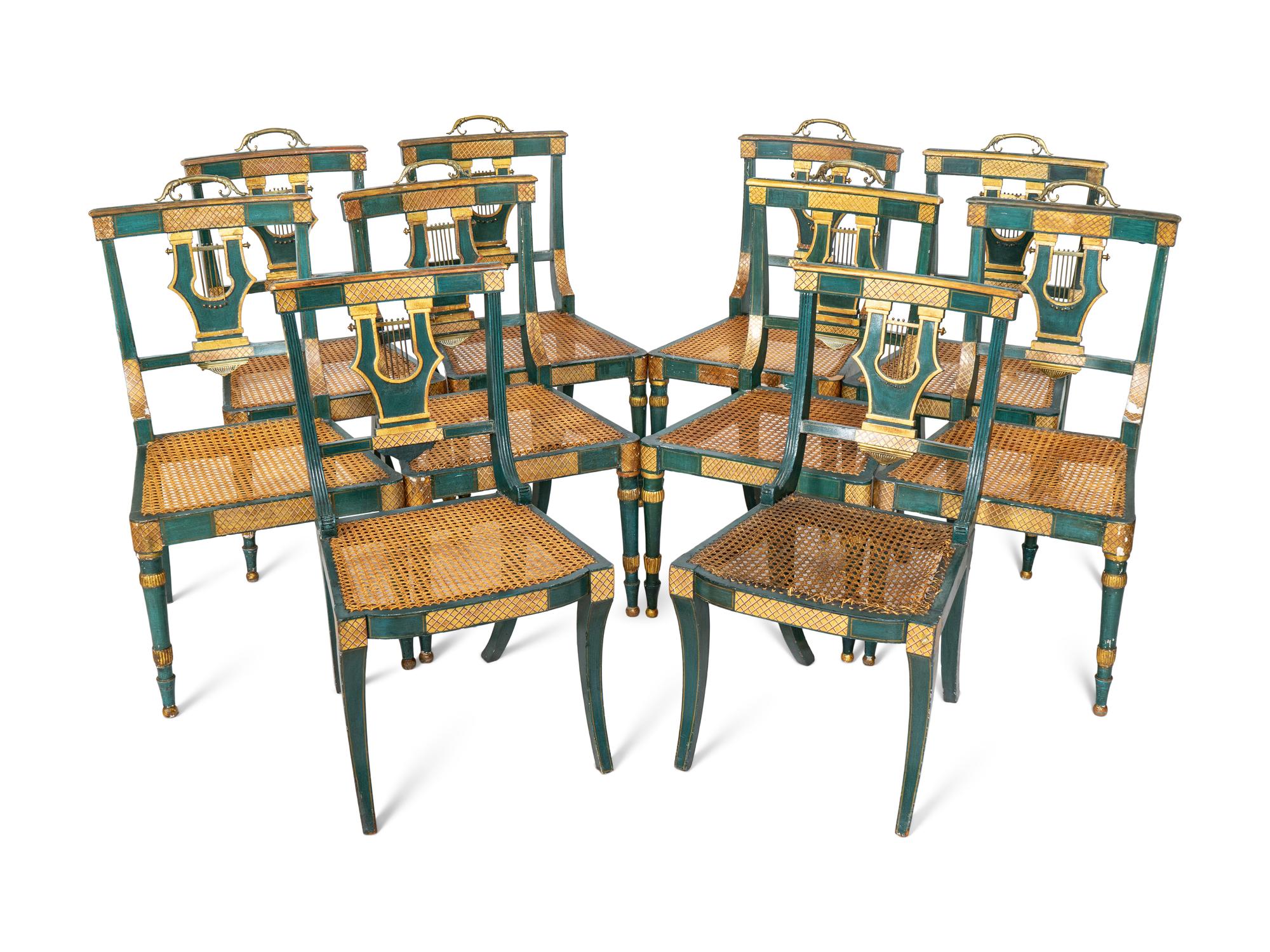 A Set of Eight Continental Green Painted and Parcel Gilt Lyre-Back Dining Chairs