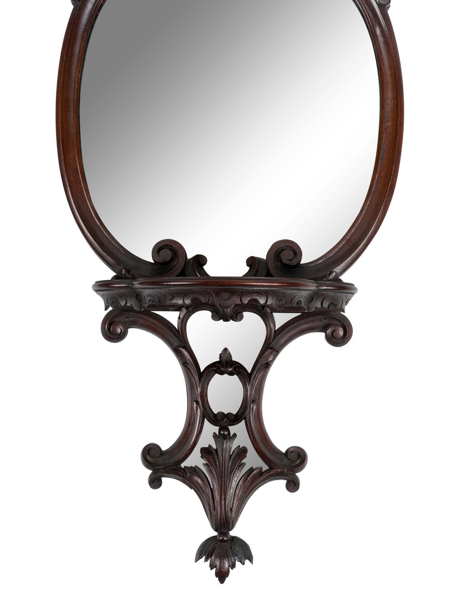 A Pair of George III Style Mirrored and Carved Mahogany Wall Brackets