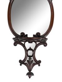 A Pair of George III Style Mirrored and Carved Mahogany Wall Brackets