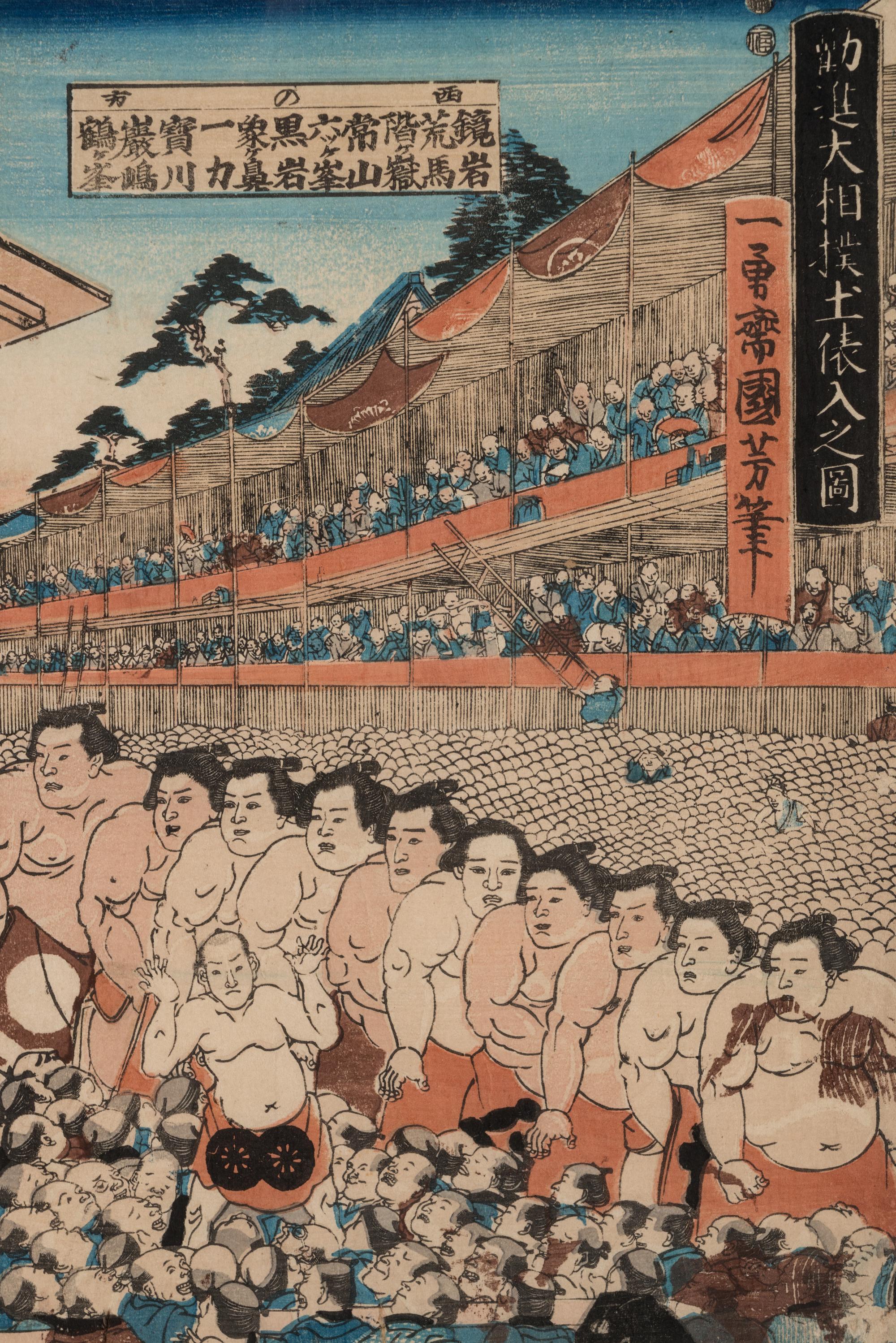 A Japanese Woodblock Triptych of a Sumo Match