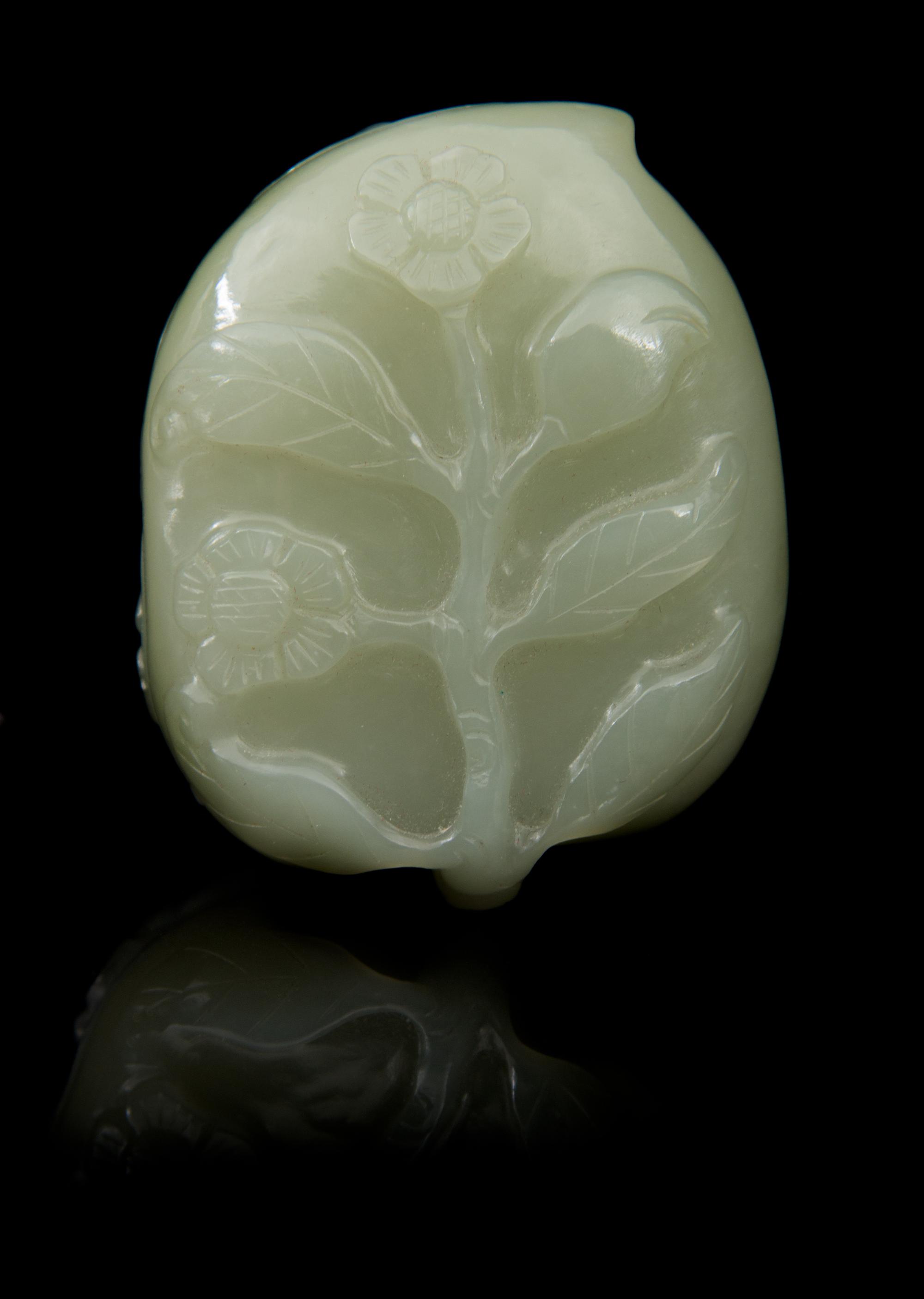 A Carved Jade Box and Cover Length 2 3/8 inches.