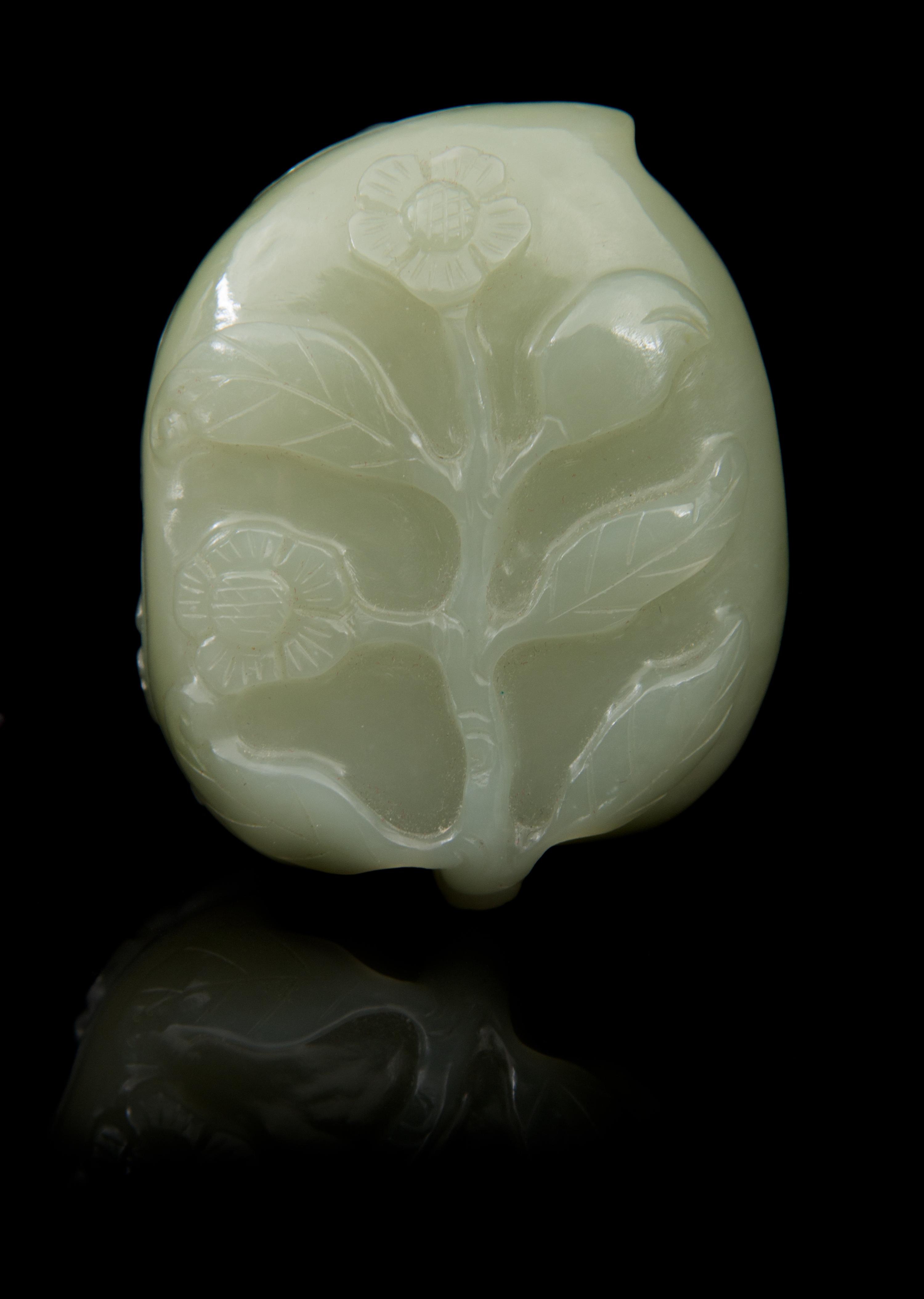 A Carved Jade Box and Cover Length 2 3/8 inches.