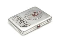 A Soviet-Era Russian Silver Cigarette Case, Maker's Mark Obscured, Moscow, Early to Mid-20th Century, the lid worked to show symbols of