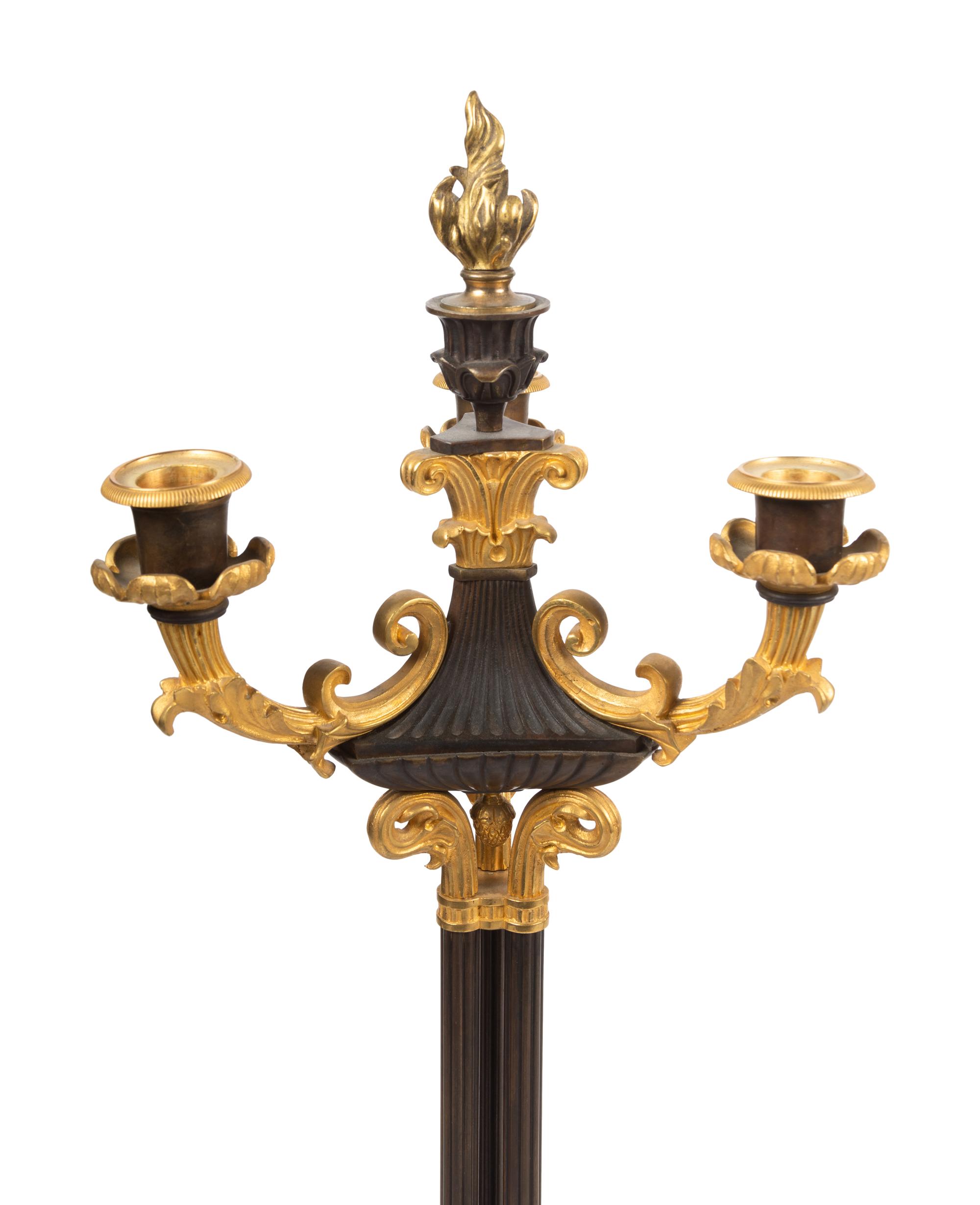 A Pair of Louis Philippe Style Gilt and Patinated Bronze Three-Light Candelabra