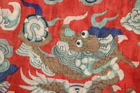 A Red Ground Kesi Woven Silk Theatrcial 'Dragon' Robe