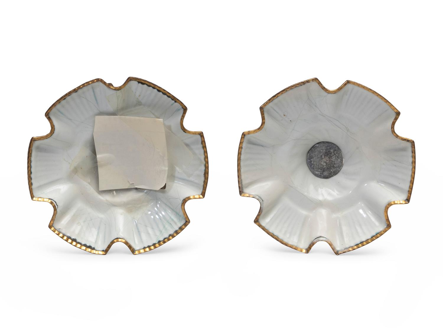 A Pair of Battersea Enamel Candlesticks