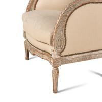 A Pair of Louis XVI Carved and Painted Bergères