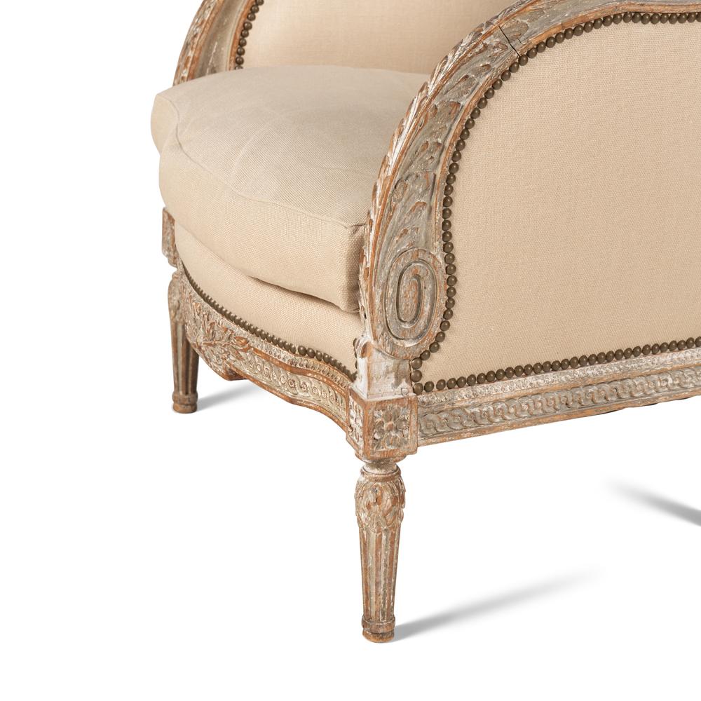 A Pair of Louis XVI Carved and Painted Bergères