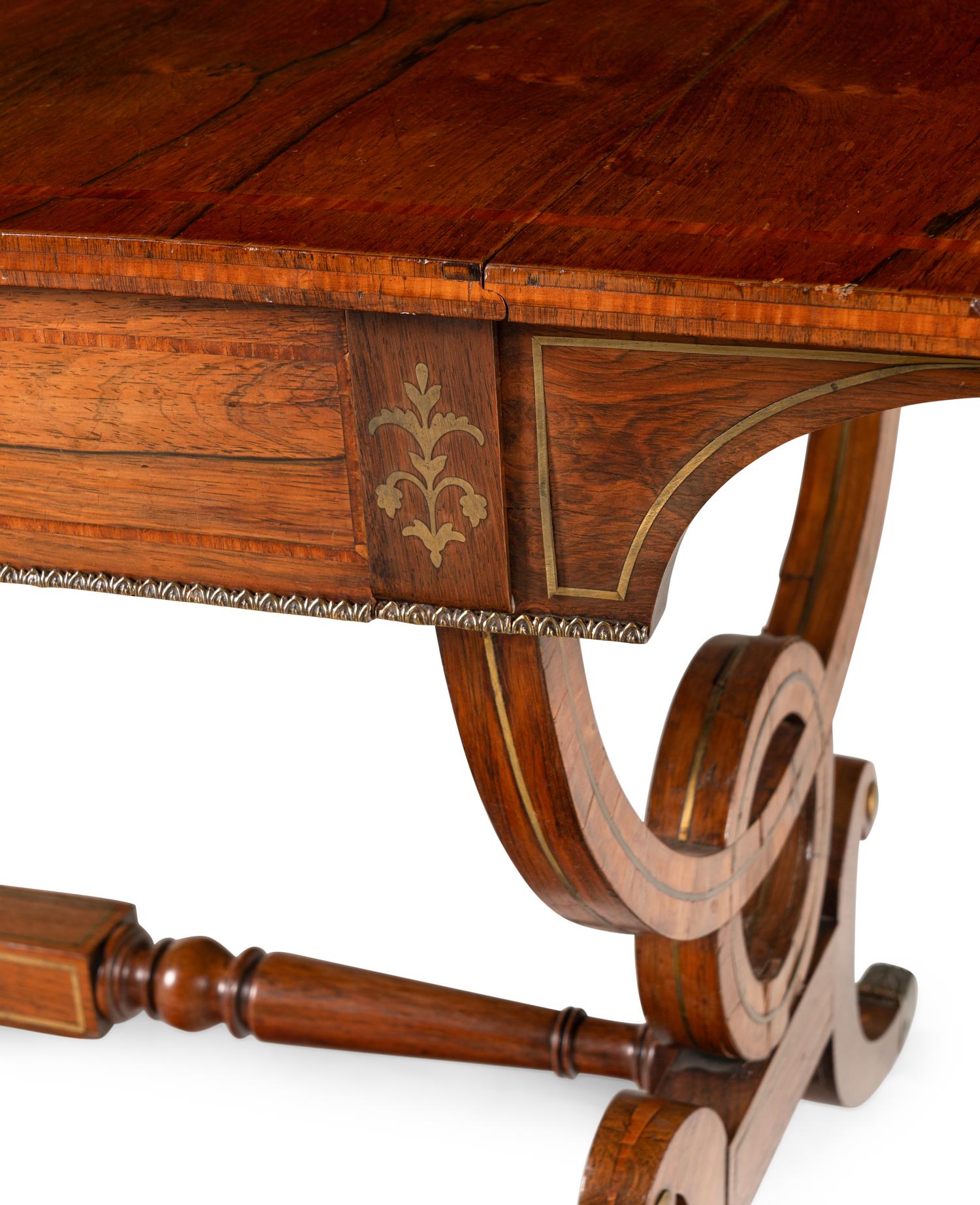 A Regency Brass Inlaid Rosewood Sofa Table